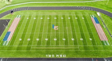 What is the Composition of a Typical Football Field and Where is the End Zone? And Why Do Bananas Never Slip on the Turf?